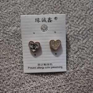 CHANEL Heart Logo Stud Earrings in Gold and White
